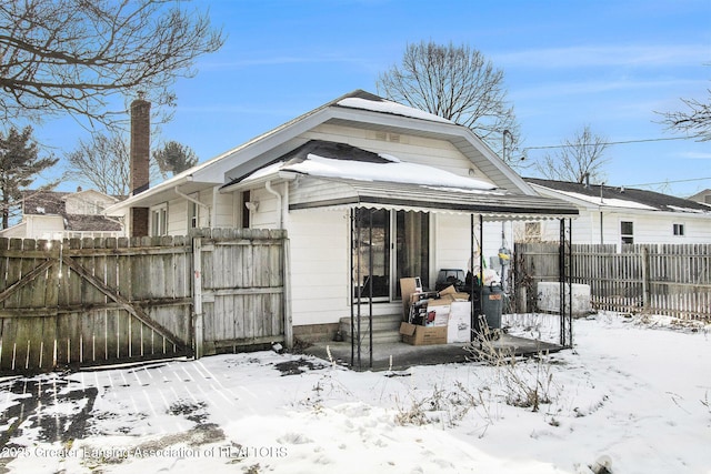 view of snow covered property