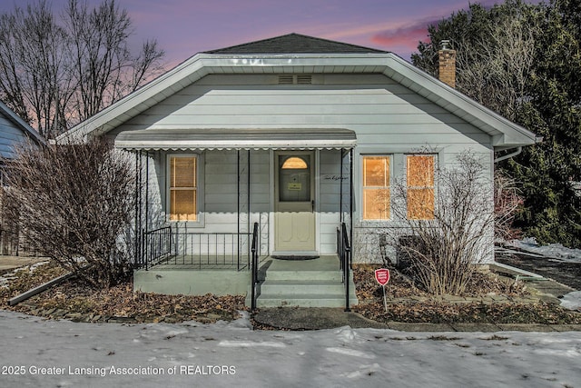 view of front of house with covered porch