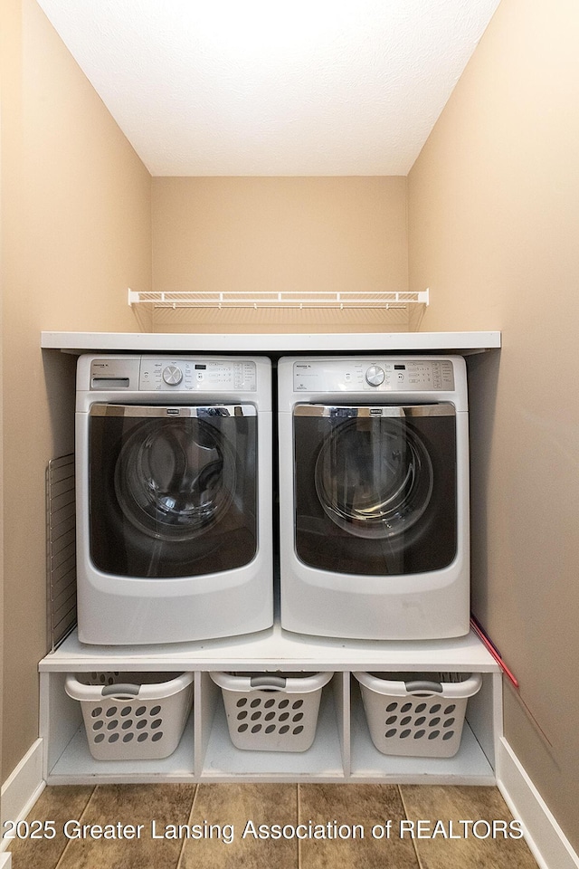 laundry area with washer and clothes dryer