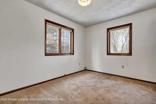 view of carpeted spare room