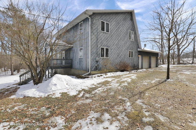 exterior space with a garage