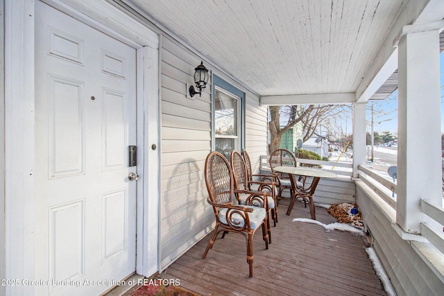 sunroom with wooden ceiling