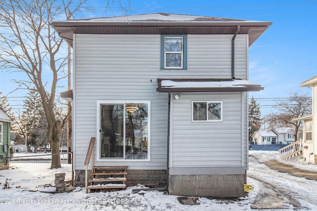 view of snow covered property