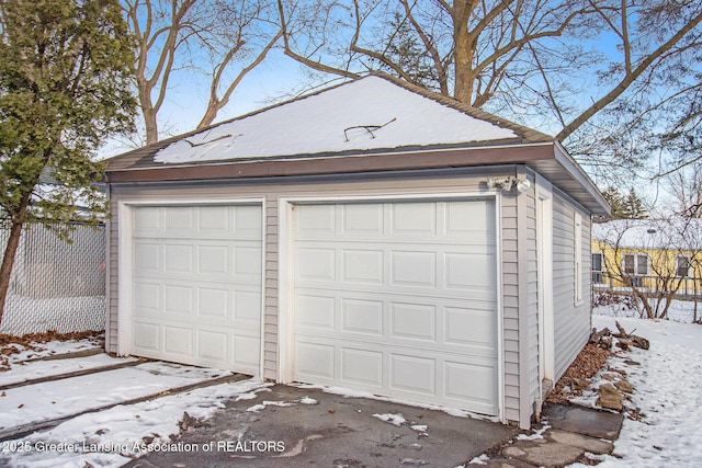 view of snow covered garage