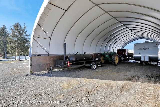 view of parking with a carport