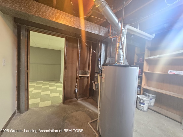 utility room with gas water heater