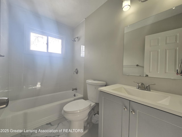 full bathroom featuring tiled shower / bath combo, vanity, and toilet