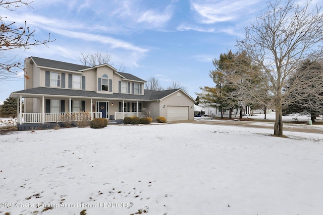 view of front of house with a porch and a garage