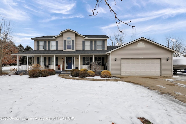 view of front of home featuring a porch and a garage