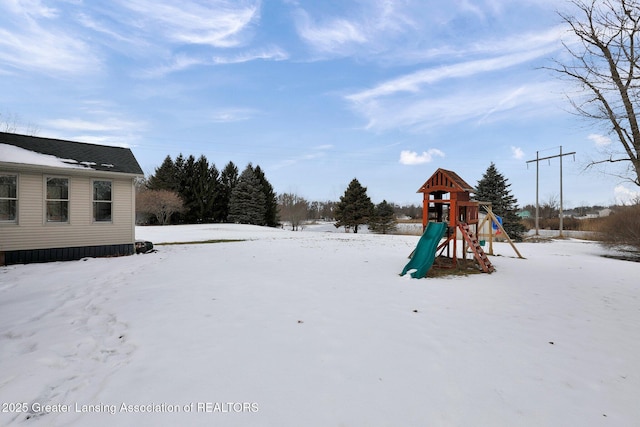 view of snow covered playground