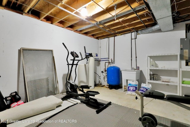 workout area with sink and electric panel