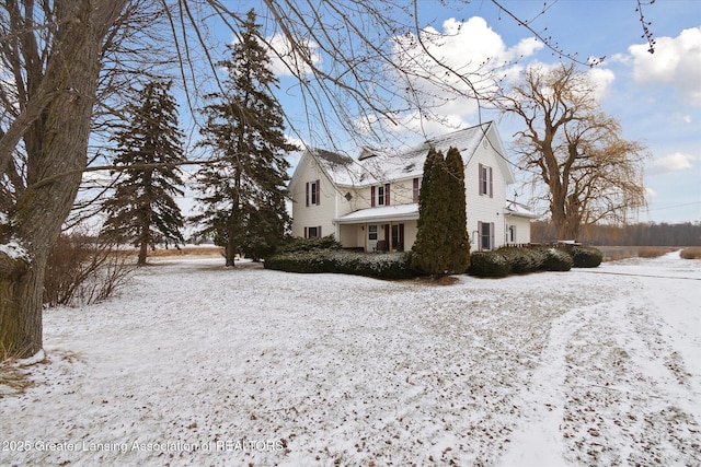 view of snow covered property