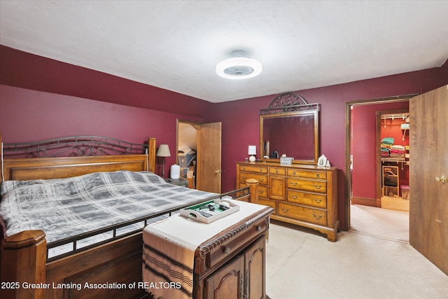 bedroom featuring light colored carpet