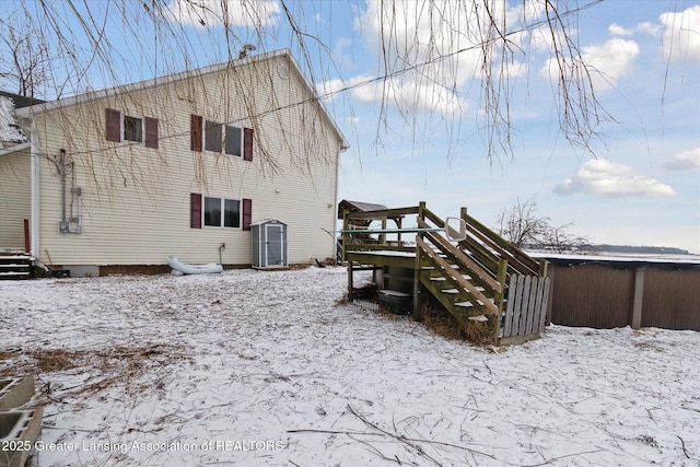 view of snow covered house