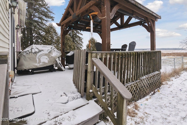 view of snow covered deck