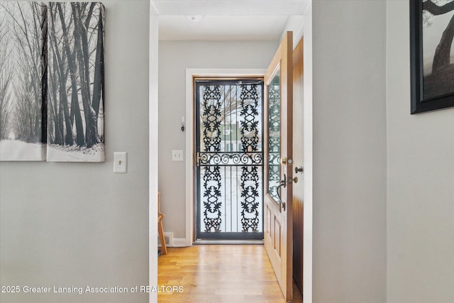 doorway featuring light hardwood / wood-style floors