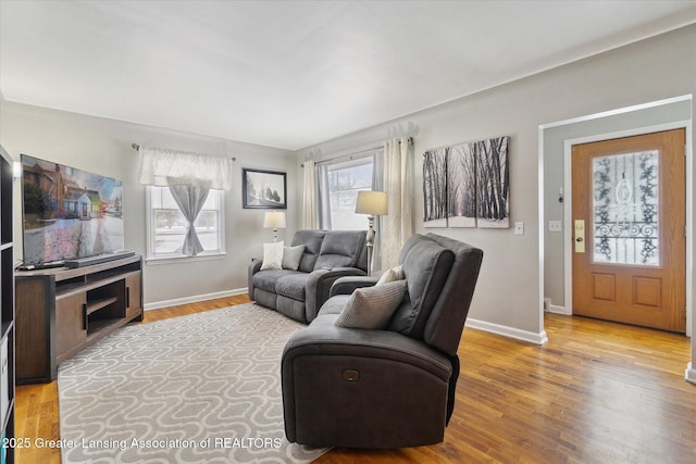 living room featuring light wood-type flooring