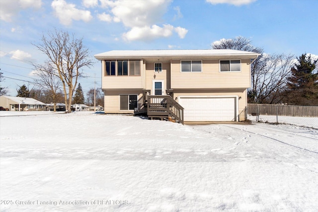 bi-level home featuring a garage