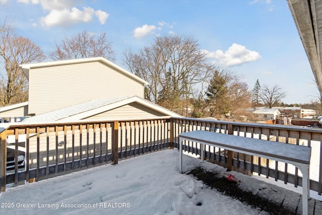 view of snow covered deck