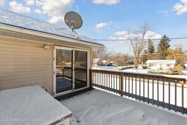 view of snow covered patio