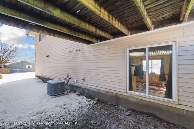 view of side of home featuring central air condition unit