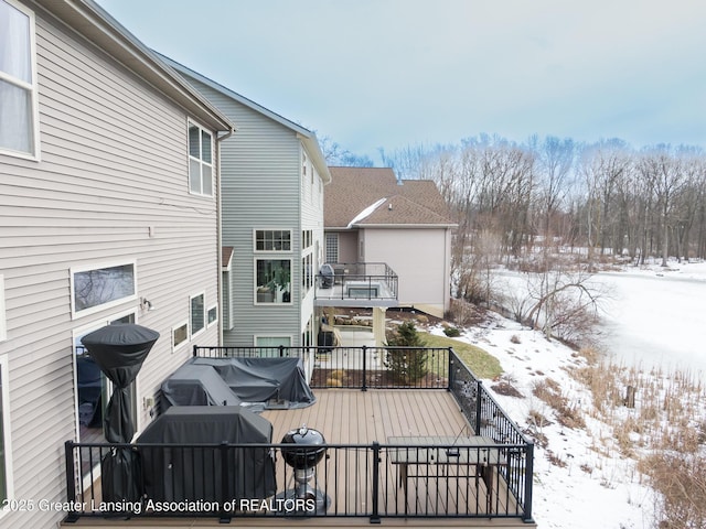 view of snow covered deck