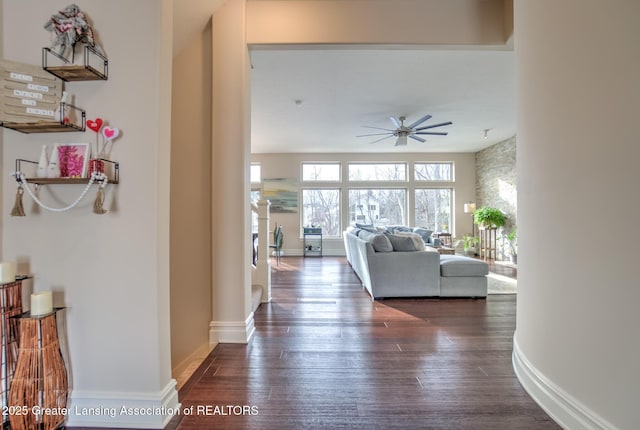 hall with dark hardwood / wood-style floors