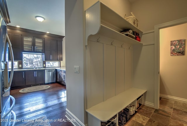 mudroom with dark hardwood / wood-style floors