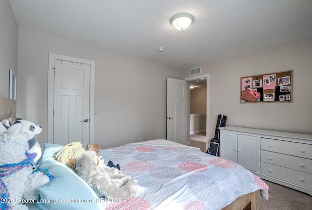 bedroom featuring carpet