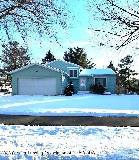 single story home with a garage