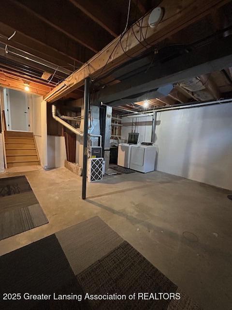 basement featuring separate washer and dryer