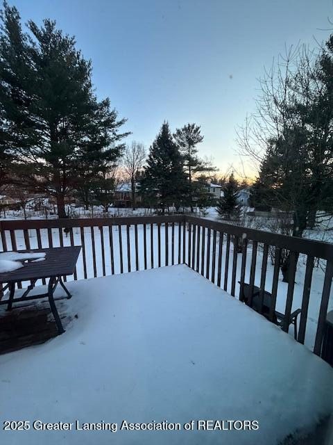 view of snow covered deck