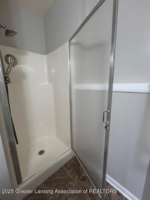 bathroom with a shower