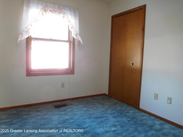 view of carpeted spare room