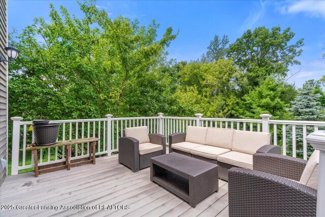 wooden deck featuring an outdoor hangout area