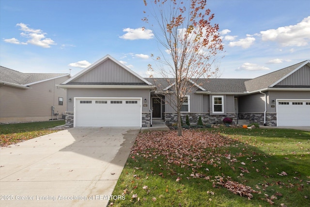 view of front facade featuring a garage and a front lawn