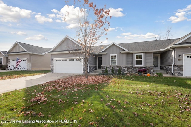 view of front of house with a garage and a front lawn