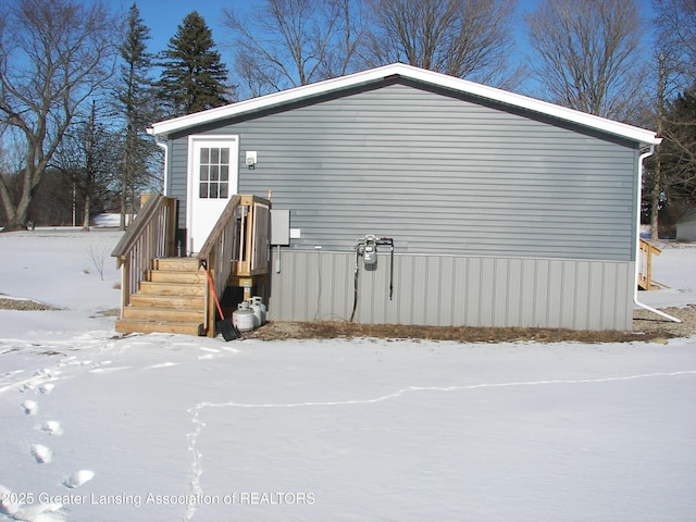 view of snow covered property