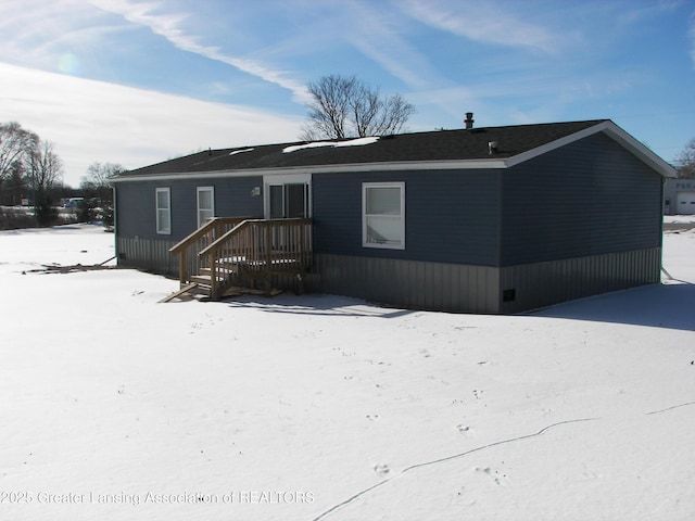 view of snow covered property