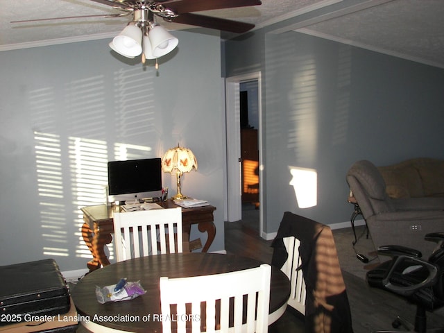 dining room with crown molding, ceiling fan, and hardwood / wood-style flooring