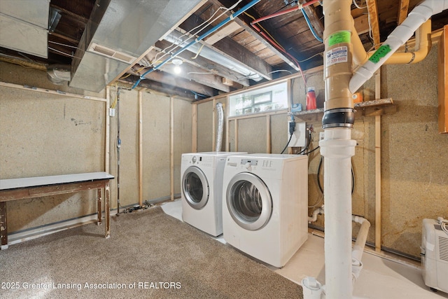 washroom featuring independent washer and dryer