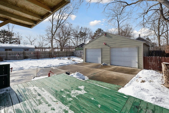 view of snow covered garage