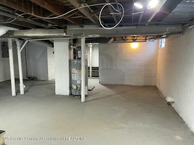 basement with water heater and electric panel