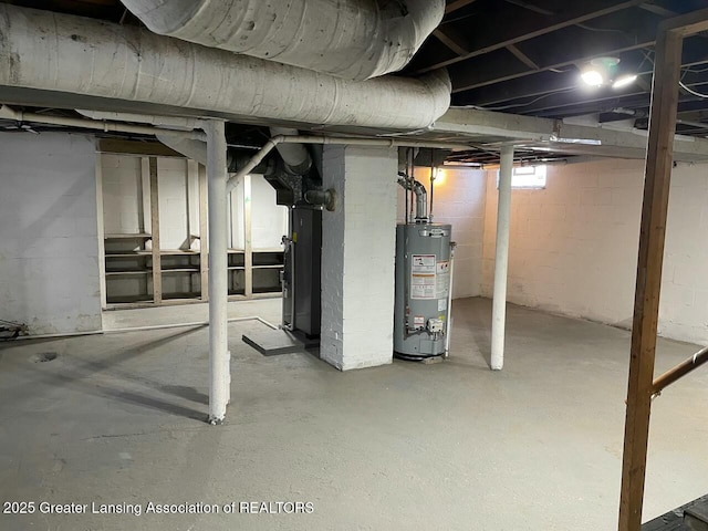 basement featuring water heater