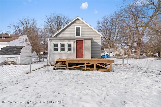 view of snow covered house