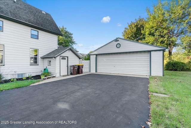 garage with a lawn