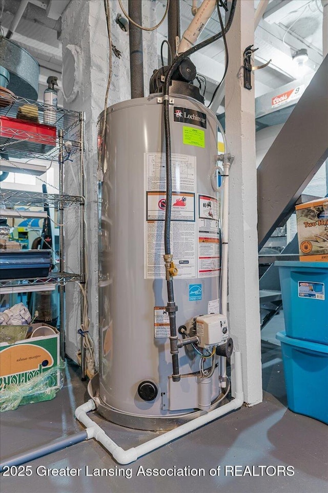 utility room featuring gas water heater