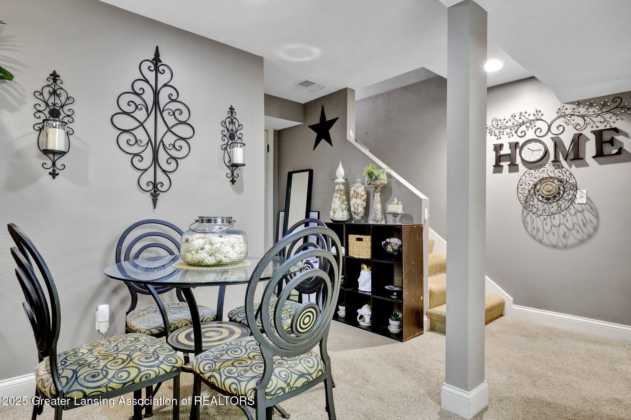 dining space featuring carpet flooring