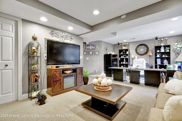 carpeted living room featuring a barn door