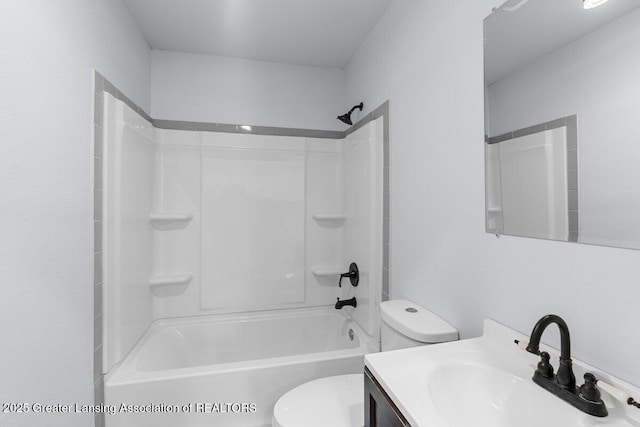 full bathroom featuring vanity, tub / shower combination, and toilet